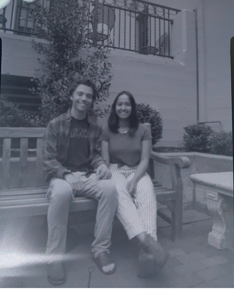 pinhole photo couple on bench
